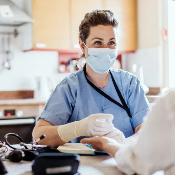 Healthcare worker at home visit